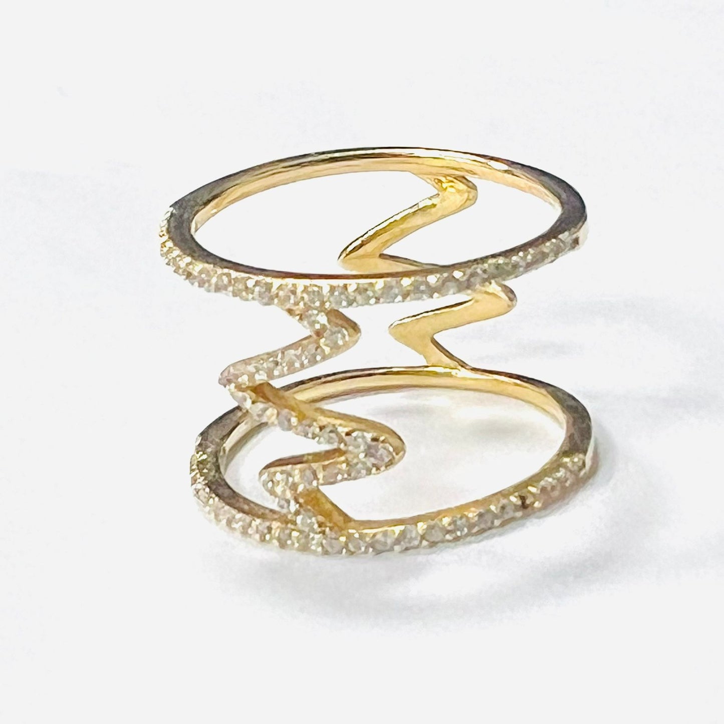 Anillo Largo zirconias doble