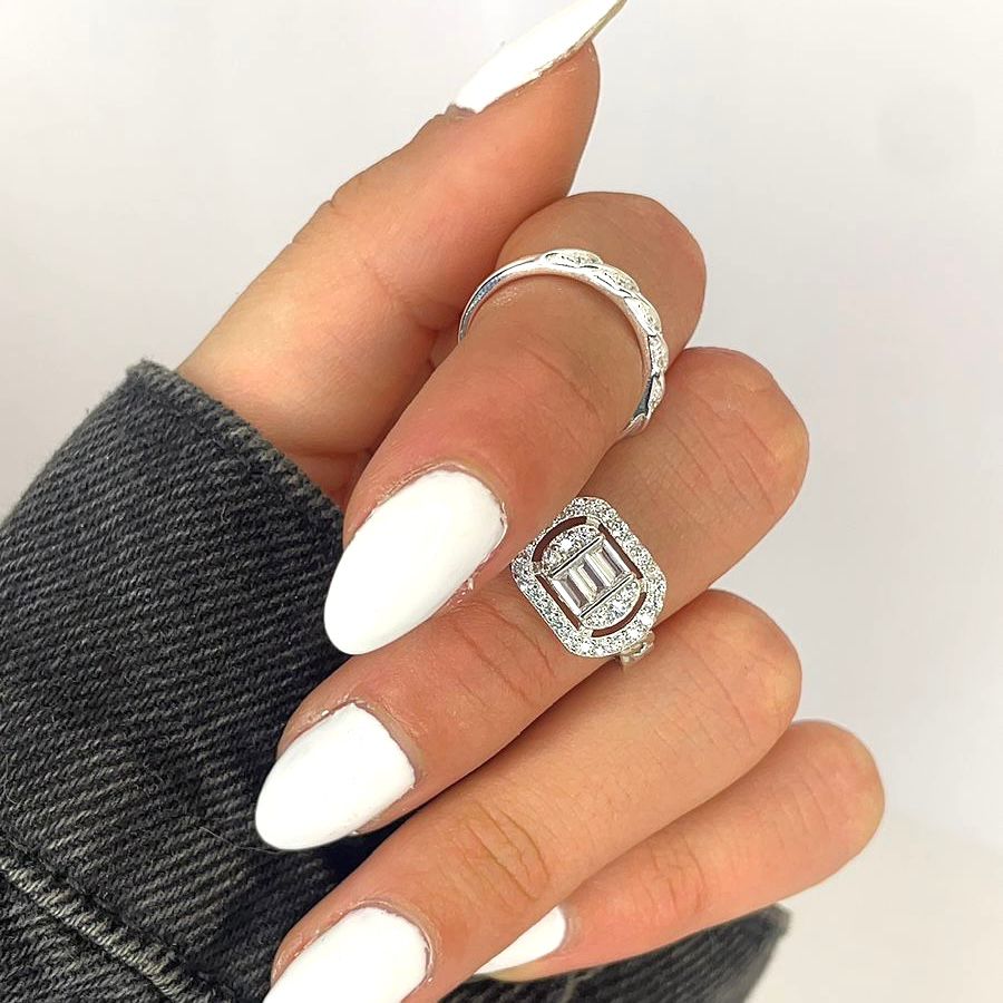 Anillo plata 925, Vintage, ovalado, zirconias blancas, redondas y baguette distintas direcciones, bordes entrelazados