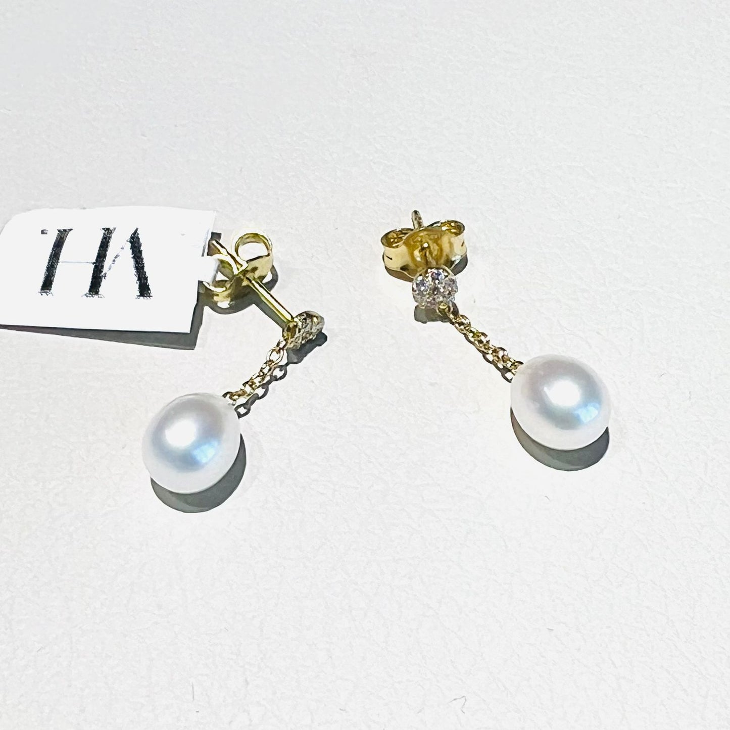 Aro Oro 18 kilates zirconitas perla
