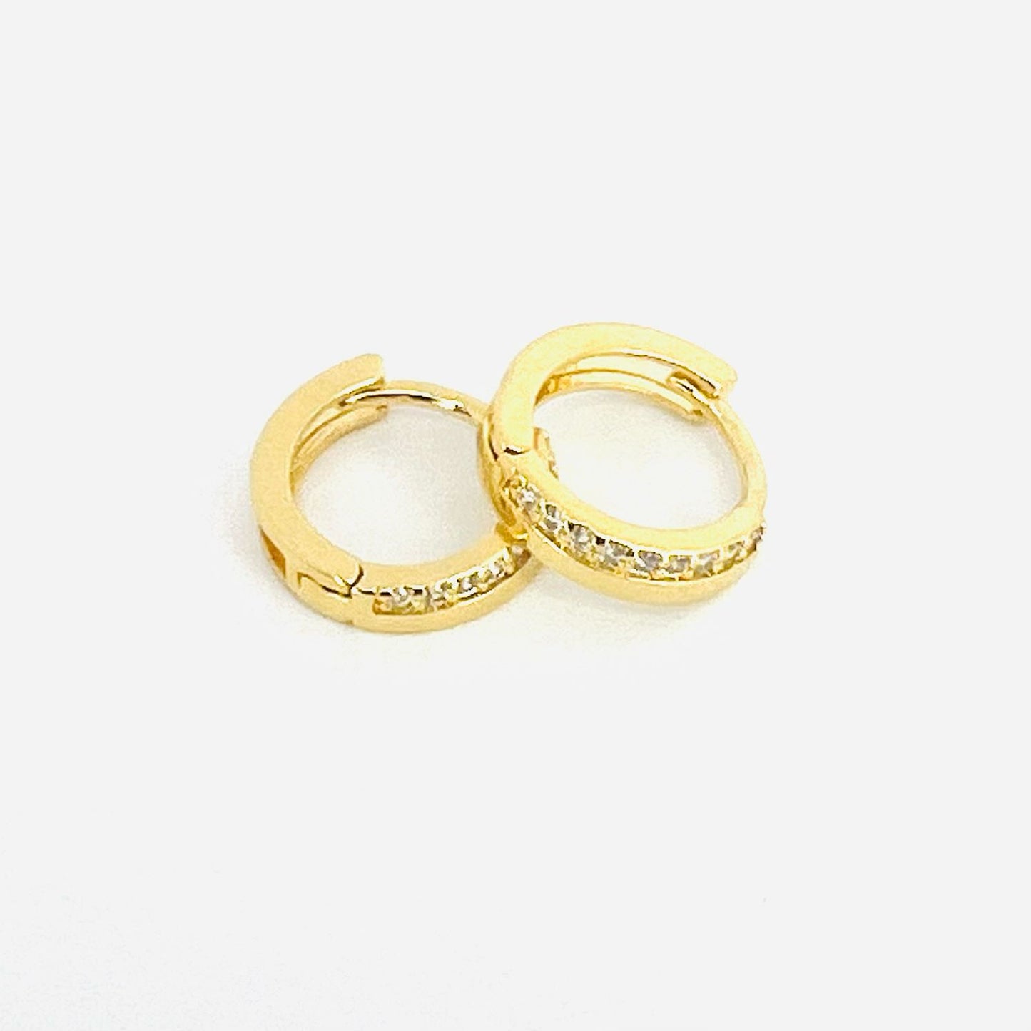 Aros argolla banda y circones baño de oro