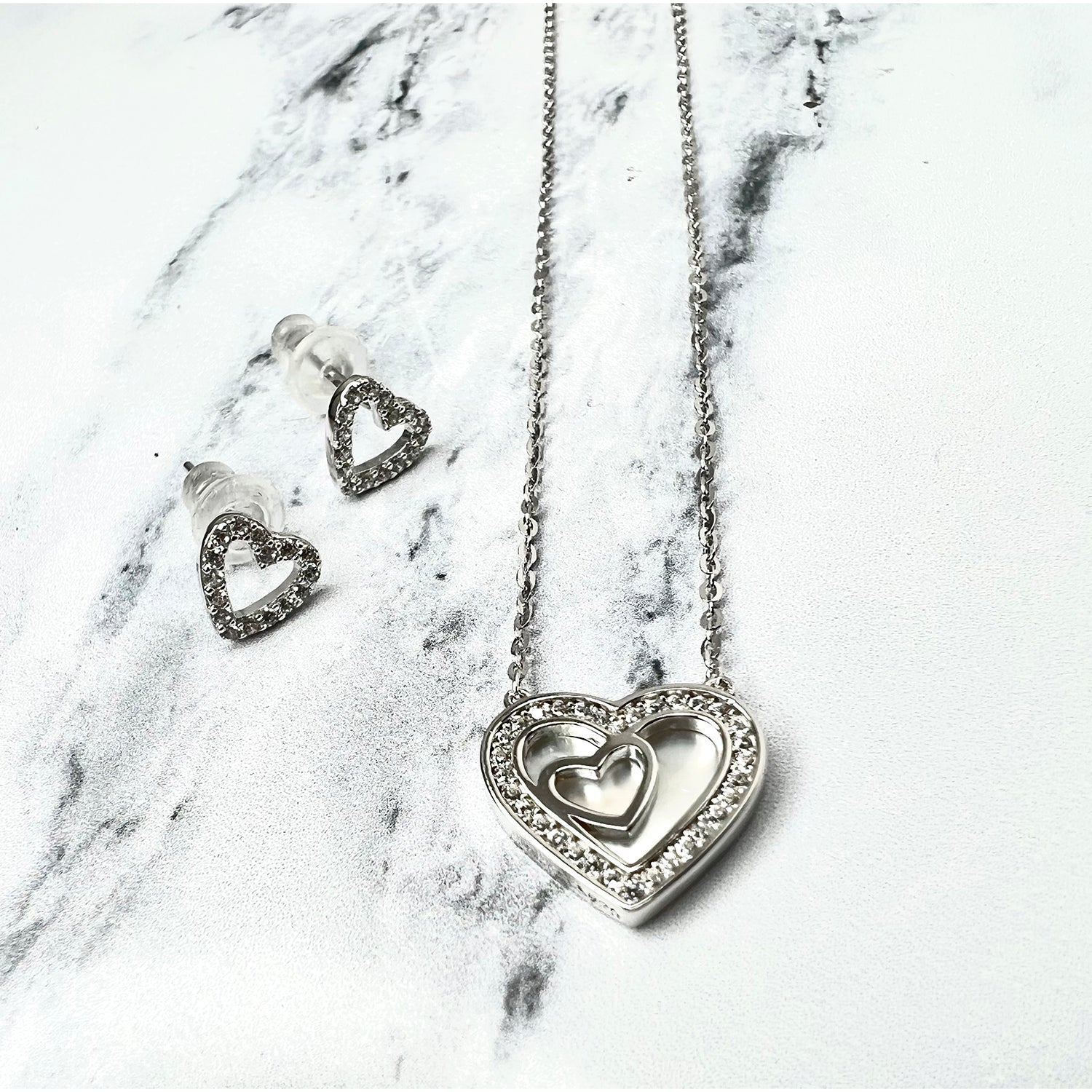 Conjunto collar aros en plata y corazon Figal Joyeria
