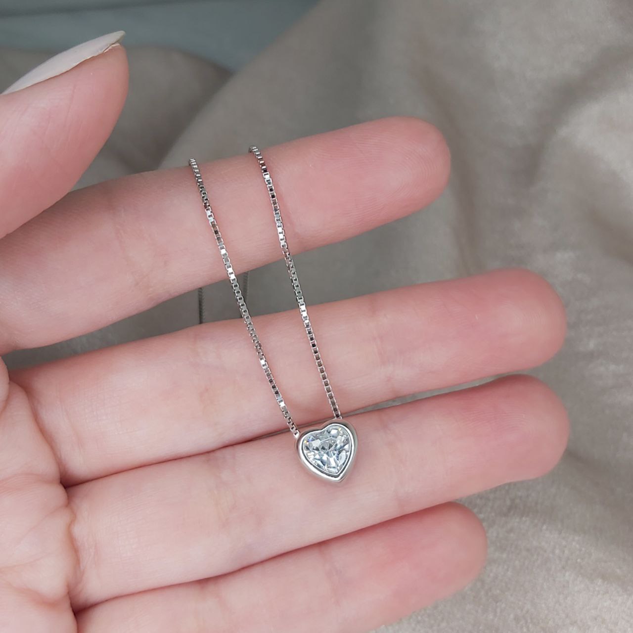 Collar en plata y corazones