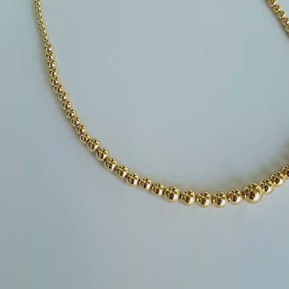 Collar en oro amarillo Italiano 18 Kilates Perlas de Oro